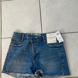 Brand new with tags mom short high-rise, crisscross, waste button jean shorts.
